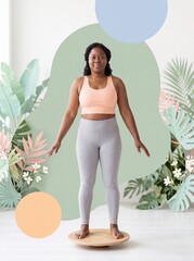 Fototapeta premium Woman balancing barefoot on a wobble balance board