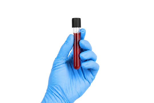 Blue nitrile gloved hand holding a blood sample collection tube with black cap, isolated on a white background for clinical laboratory testing, hematology, diagnosis, and healthcare concepts.