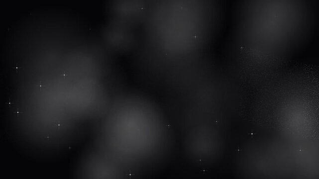 A serene view of distant white stars scattered across a deep black void