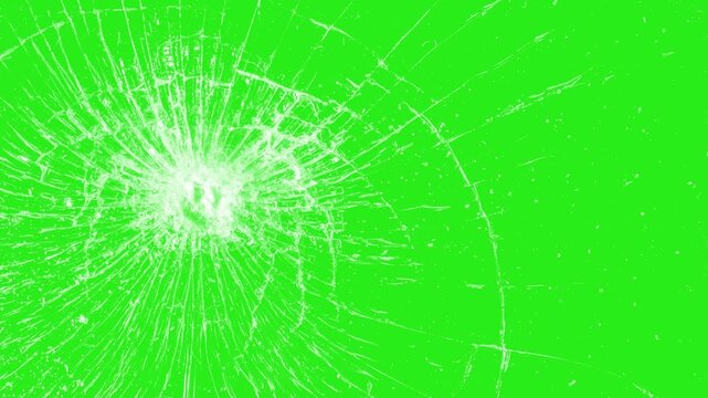 Broken cracks glass fracture effect texture isolated abstract background. Broken glass on black background. Glass is breaking. Dynamic explosion of a glass shattering on green screen  