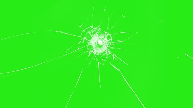 Broken cracks glass fracture effect texture isolated abstract background. Broken glass on black background. Glass is breaking. Dynamic explosion of a glass shattering on green screen  
