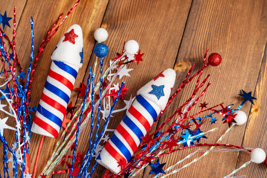 Set of Pyrotechnic Rockets on wooden background, with Traditional American Design for Fourth of July and Other Holidays of USA