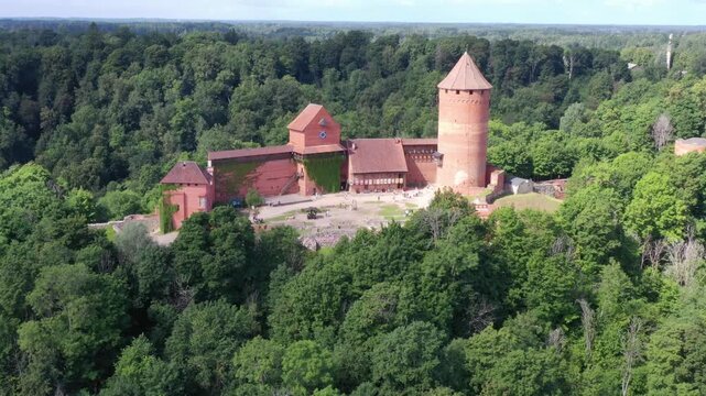 Latvia - Turaida Castle (Latvian: Turaidas pils, German: Treiden) above the Gauja River in Sigulda. Construction of the castle was started in 1214.