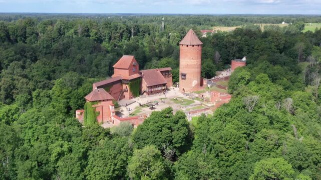 Latvia - Turaida Castle (Latvian: Turaidas pils, German: Treiden) above the Gauja River in Sigulda. Construction of the castle was started in 1214.