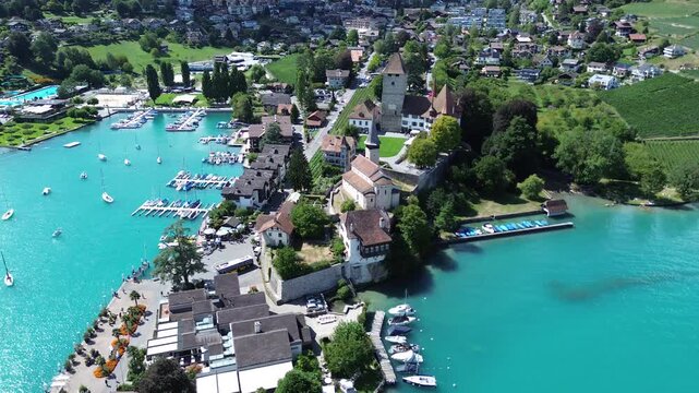 Aerial Drone View of Spiez Harbor and Turquoise Lake Thun, Switzerland