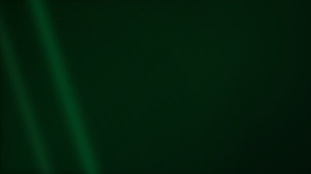 Abstract dark green background with soft diagonal light and smooth texture