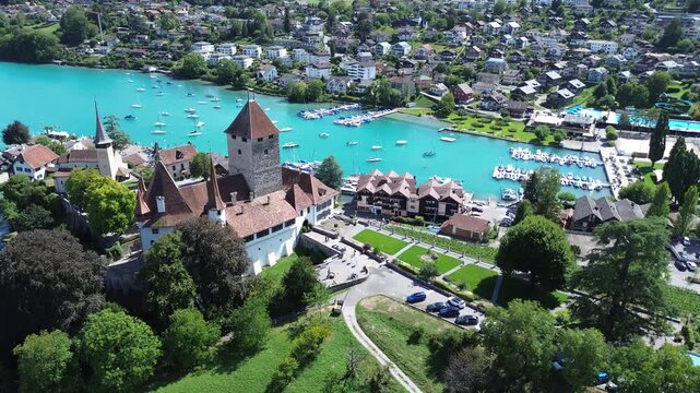 Aerial Drone View of Spiez Castle, Harbor and Lake Thun, Switzerland