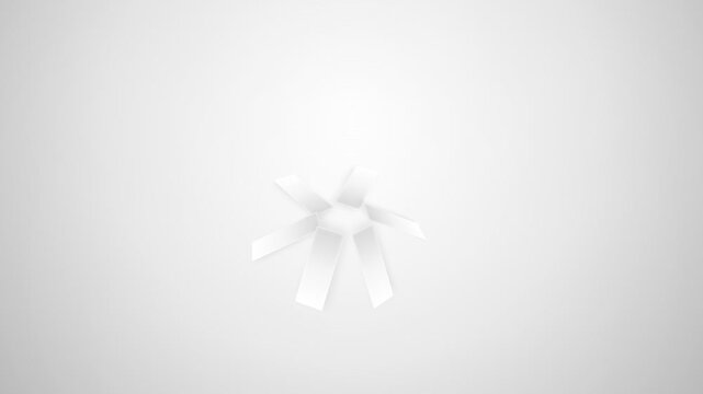 Minimalist white abstract flower shape on a smooth light grey background
