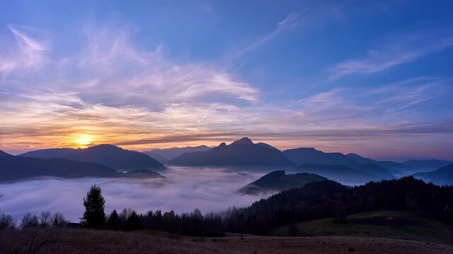 Timelapse of Sunset Over Mountain Range with Cloud Inversion and Valley Fog