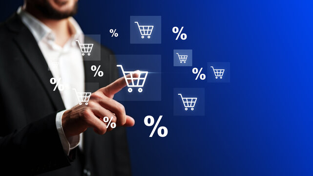 Using a touchscreen for online shopping while discounts show on a blue background