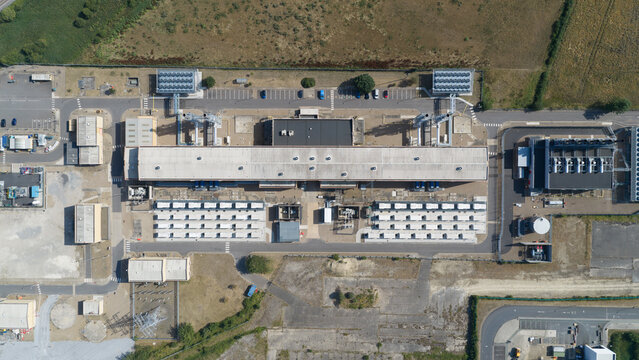 Aerial view of Brigg Renewable Energy Plant with its industrial buildings, cooling systems, and surrounding infrastructure in Scawby, England, United Kingdom.