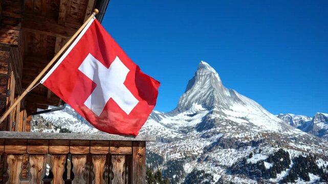Swiss flag waving on wooden chalet balcony with iconic matterhorn mountain peak background, in zermatt
