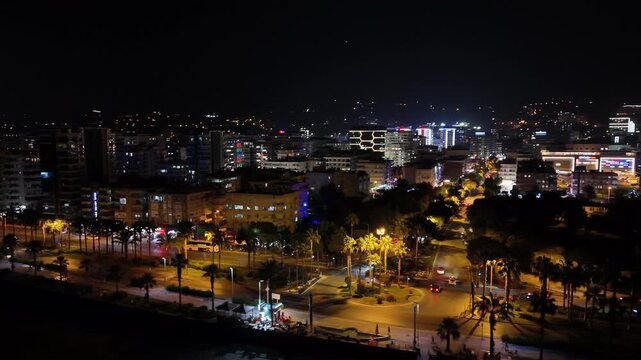 Aerial drone view of Alanya, Turkey at night, featuring the illuminated Mediterranean coastline, city lights, beachfront, urban landscape and night resort atmosphere.
Night aerial view of Alanya on th