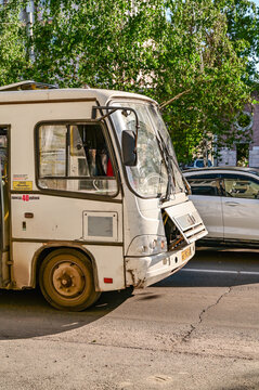 White PAZ-3204 minibus (marshrutka) with its hood open on a city street in Barnaul; a Russian public transport bus in the Altai region, Russia 25.05.25