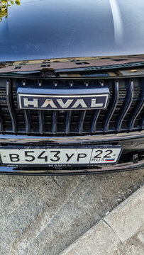Front view of a Haval hybrid electric SUV with the Haval logo and a Russian license plate in Barnaul, a modern Chinese crossover, Altai Region, Siberia, Russia 25.05.2025