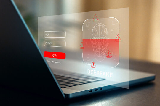 Deep fake warning displayed on a laptop screen at a home office during daytime hours