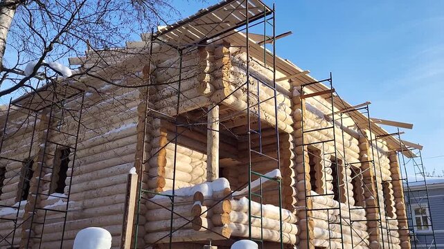 Construction of a residential wooden log house