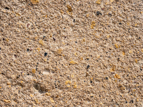 textured wall from orange armenian tuff stone
