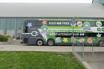 Obraz premium Go Transit electric bus on display outside the Enercare Building, Exhibition Place, Toronto