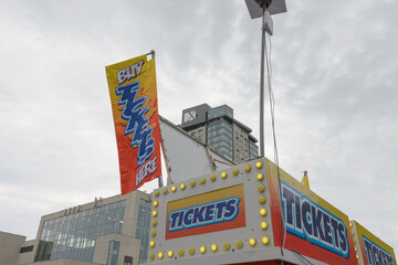 Obraz premium midway amusement rides ticket vendor and distant view of Hotel X, Exhibition Place, 111 Prices' Blvd, Toronto (22 August 2026)