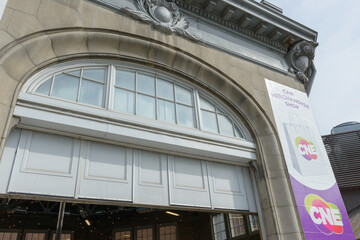 Obraz premium wall mounted banner of the CNE Merchandise Shop outside historic building (Railways Building/Music Building, 1907), Exhibition Place, Toronto (22 August 2026)