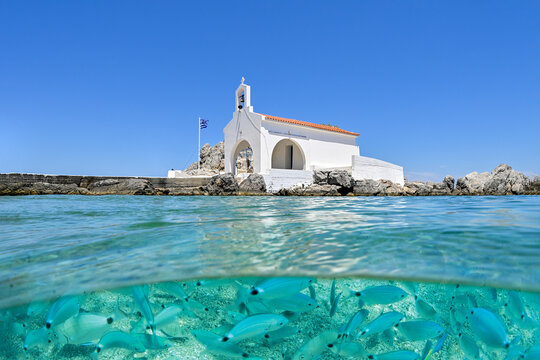 Half underwater image of Chapel Saint Isidore of Sykiad, Chios Island, Greece       