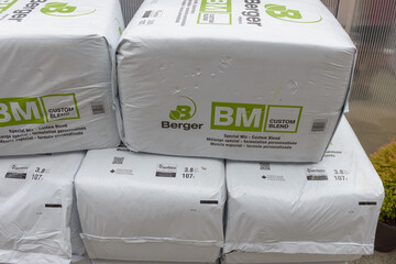 Obraz premium bales of Berger growing medium outdoors in Toronto