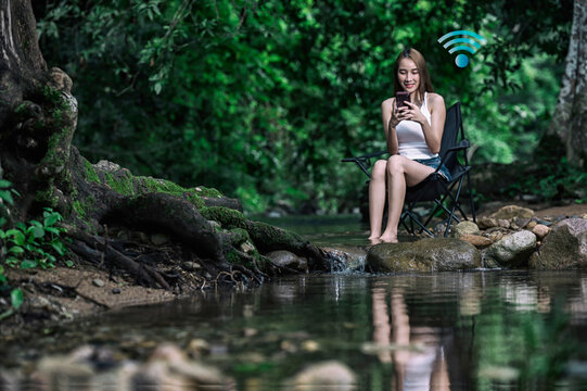 Young Woman Recharging Herself in Nature