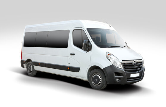 White commercial passenger minibus van Opel Movano three quarter front view isolated on gradient background, modern transport van
