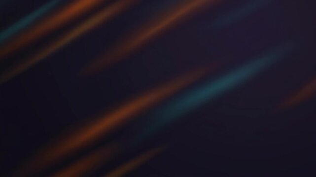 Abstract dark background with diagonal blue and orange light streaks