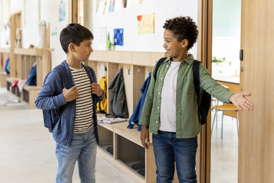 Classmate welcoming a new student on the first day of school