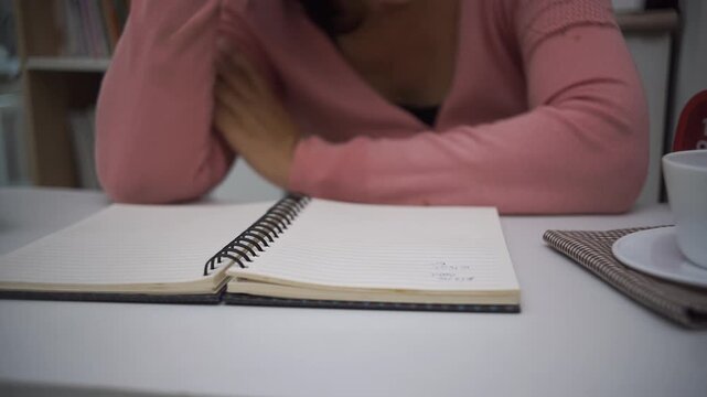 Planner plan Schedule Calendar and reminder agenda, work online at home. Man hand planning daily appointment and write business trip in diary book at office desk. 2026 Calendar reminder event concept.