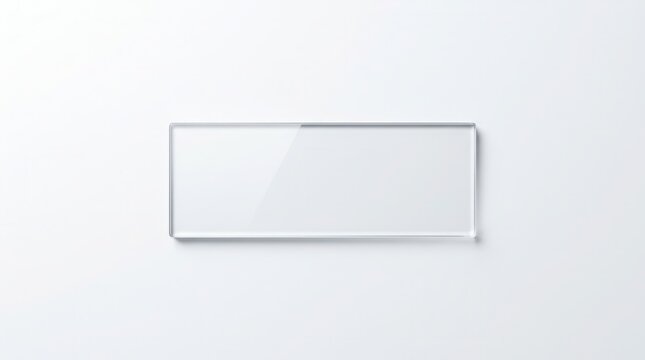 Scientific clarity and precision shown by a glass microscope slide positioned on a white background for educational laboratory visuals.