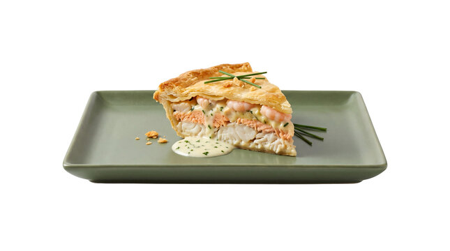 Gourmet seafood pie slice with salmon and shrimp, savory fish pastry on green plate, elegant restaurant appetizer isolated on white
