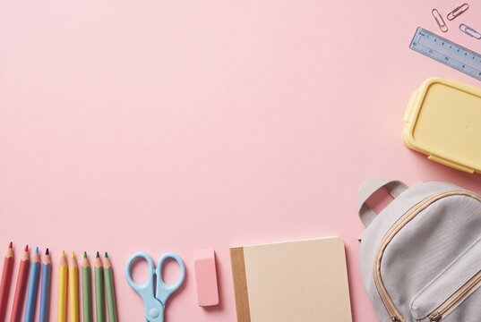 Pastel School Supplies Flat Lay on Pink Background