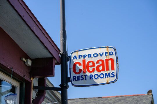 Vintage "Approved Clean Restrooms" Sign on the Front of a Neighborhood Restaurant 