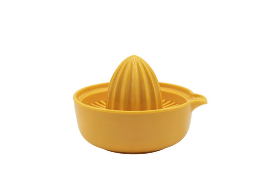 Bright yellow plastic manual citrus juicer with a ribbed reamer for extracting fresh fruit juice at home isolated on a transparent background