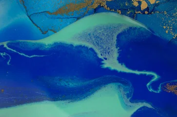 Abstract wave blue and gold marble background. Original Hand-drawn artwork made with ink on paper © Anna Babii