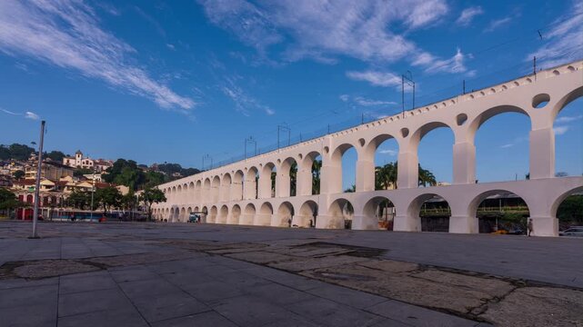 Time lapse from the Arcos da Lapa aquaduct in Rio de Janeiro, Brazil. Also called Carioca Aqueduct - with an old tram passing. The aqueduct was built in the middle of the 18th century