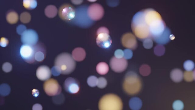 Soft pastel bokeh lights drifting gently in a dark studio atmosphere with subtle cinematic motion