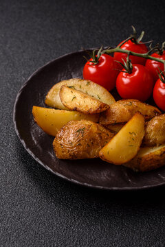 Fried potato wedges seasoned with salt and spices, ready for dinner table. Fried potato wedges