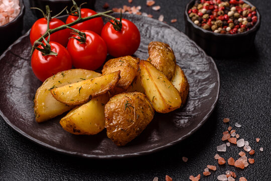 Fried potato wedges seasoned with salt and spices, ready for dinner table. Fried potato wedges