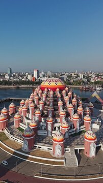 Aerial drone flying over 99 domes mosque in makassar indonesia