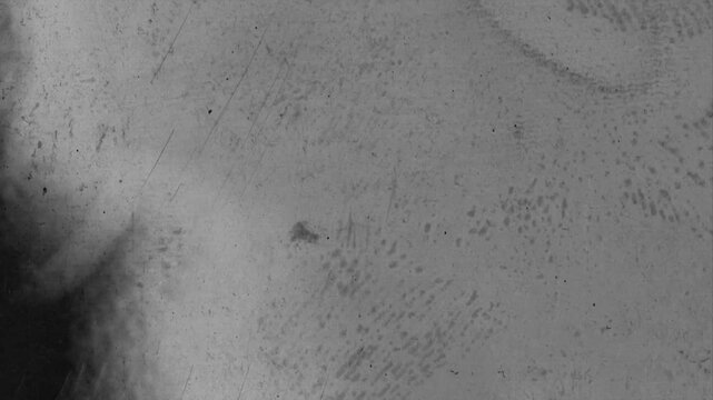 Fast rewind of extreme close-up vintage x-ray radiograph scan textures. Seamless looping grunge film overlay with dust, scratches and noise.