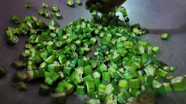 Fresh Green Okra Saut&eacute;ing in Pan
