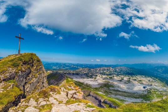 Hoher Ifen summit cross and alpine panorama in Austria