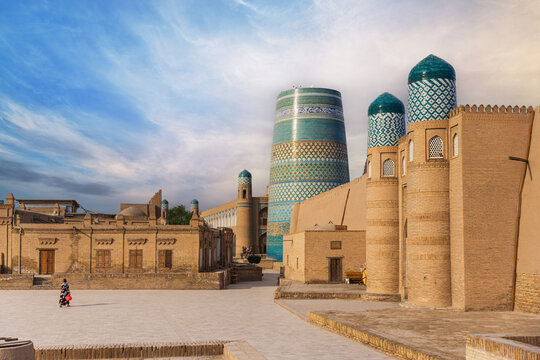 Historic Itchan Kala Street with Kalta Minor Minaret and Palvan Darvaza Gate in Khiva