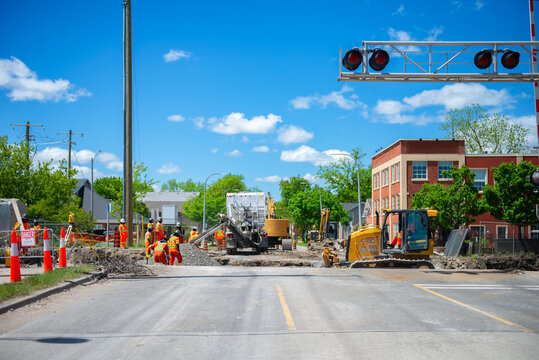 railway construction in Canada, building the renewal of a level crossing, upgrading from a single line to twin track
