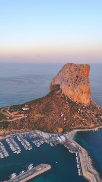 Aerial view of penon de ifach rock and marina in calpe spain