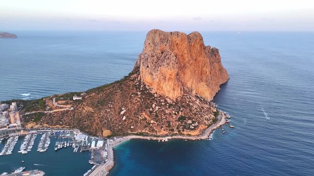 Calpe's penon de ifach rock aerial view at sunset
